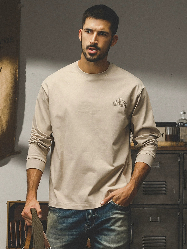 Camiseta Jereno de algodón peinado grueso de 260 g, estilo americano, para hombre, con estampado de montaña de otoño, holgada, moderna y combinable.