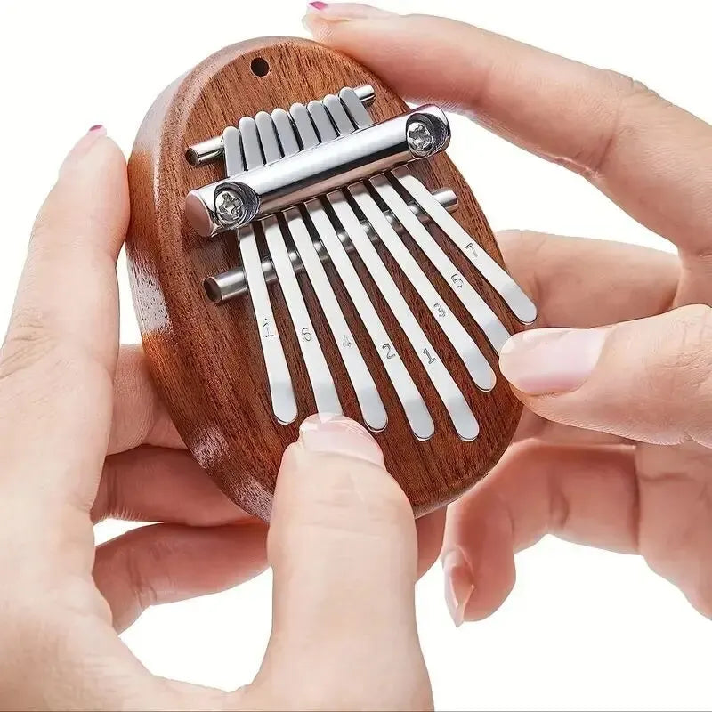 Mini Kalimba de madera de 8 teclas, de alta calidad, exquisito piano de pulgar, marimba musical, buen accesorio colgante, regalo