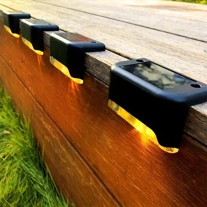 Paquete de 4 lámparas LED solares para escaleras, impermeables, para pasillos, patios, barandillas, luces nocturnas para exteriores, jardines, bordes y terrazas.