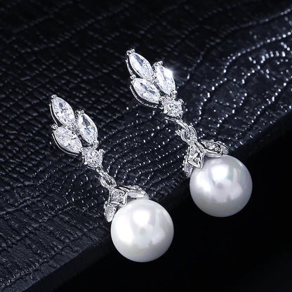 Pendientes colgantes de perla de circonita AAA de color plateado ZAKOL para mujer, pendientes de novia con circonita de hoja brillante, joyería para fiesta de boda
