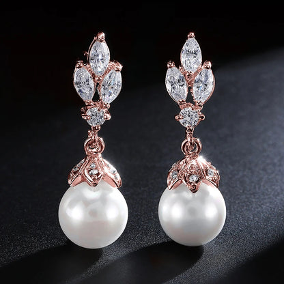 Pendientes colgantes de perla de circonita AAA de color plateado ZAKOL para mujer, pendientes de novia con circonita de hoja brillante, joyería para fiesta de boda