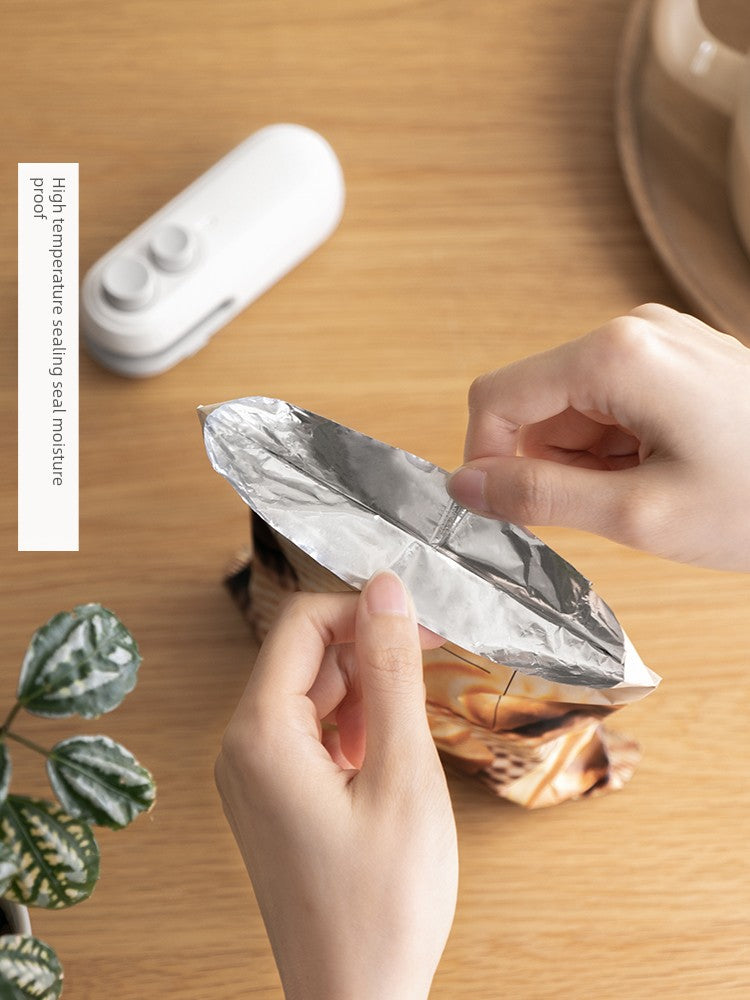Máquina selladora de bolsas de plástico a presión manual para mini snacks
